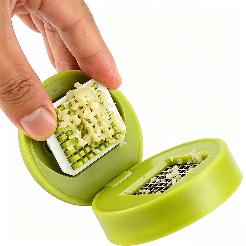 Picadora y prensadora de ajo mini con recipiente