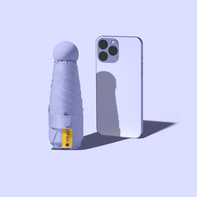 Sombrilla compacta plegable protección contra rayos UV