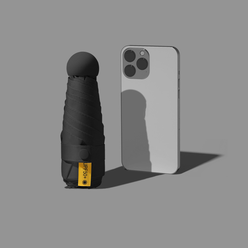 Sombrilla compacta plegable protección contra rayos UV