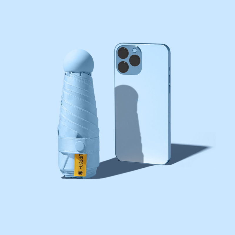 Sombrilla compacta plegable protección contra rayos UV